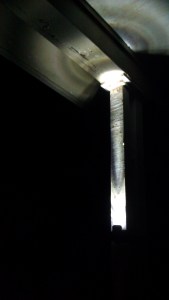 After the National Guard saw my door open and came into my house to investigate, I taped my bike light to my porch so they knew somebody was home. (Tanya Mikulas, photographer)