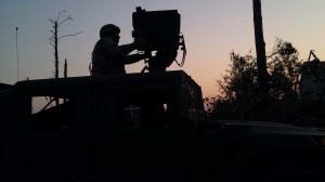 Curfew enforcement by the National Guard with IR-equipped vehicles. Tanya Mikulas, photographer.