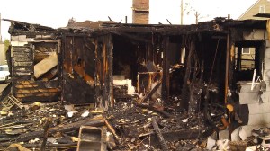 On the night of April 29, a fire was reported in Forest Lake neighborhood. This was the house, one block south of mine. Tanya Mikulas, photographer.