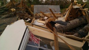 roll tide football shaker in a pile of debris. Tanya Mikulas, photographer.