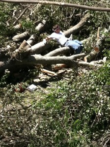 Tanya Mikulas in a pile of tornado debris, April 29, 2011.